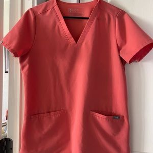 Coral colored figs scrub top